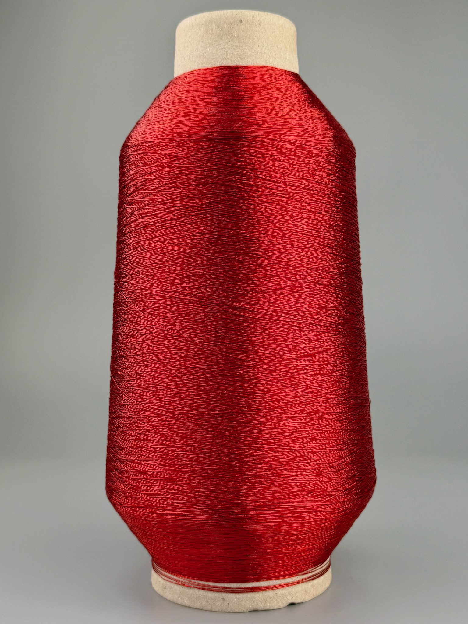 Torcitura di Domaso Zenzero Nm 1700 – Viskosegarn mit Metallfaser col. Rubinrot 604 foto 2